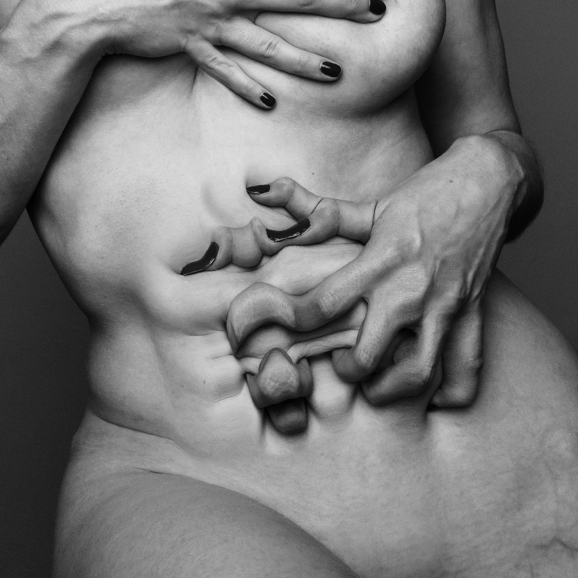 A high-contrast photograph of a deconstructed nude portrait, by artist Ras Alhague, entitled "skin", created in 2020